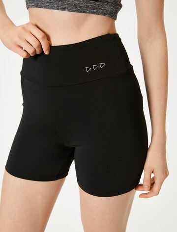 Koton Slim fit Leggings in Black: front