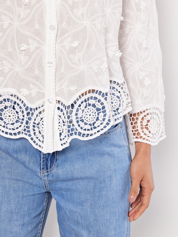 Chemisier ' ' Apricot en blanc