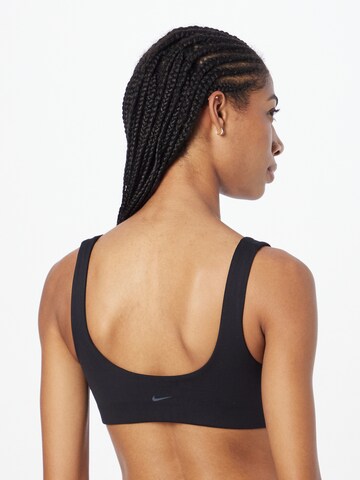 NIKE - Soutien Bustier Soutien de desporto em preto