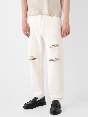 Bershka Loose fit Jeans in Beige: front