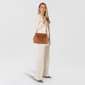 Borsa a mano 'Calebra' di GUESS in marrone