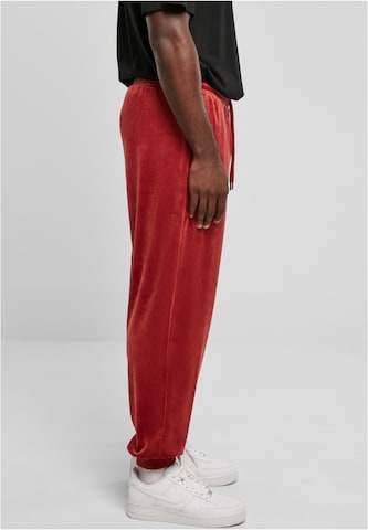 Loosefit Pantaloni di Karl Kani in rosso