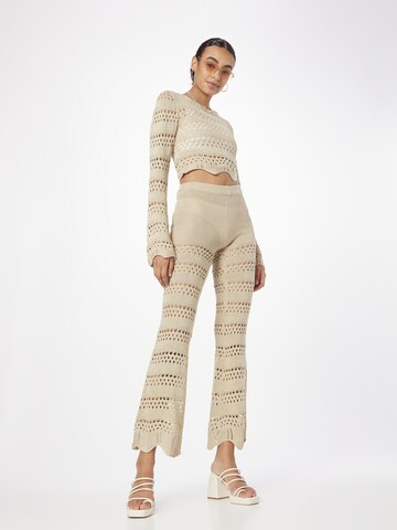 Urban Classics Flared Trousers in Beige