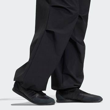 ADIDAS SPORTSWEAR - Pierna ancha Pantalón deportivo en negro