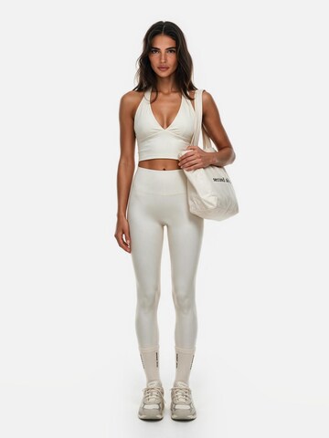 Top sportivo 'Second Skin Studio Halter Top' di GOD SAVE QUEENS in beige
