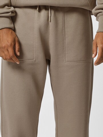 Bershka Tapered Hose in Beige