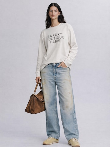 Mansour Shirts 'Mansour Luxury Boutique' i hvid: forside