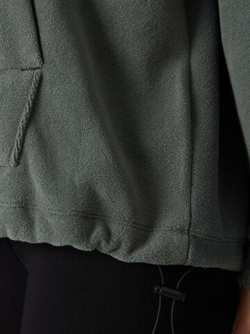 Sweat-shirt Tommy Life en vert