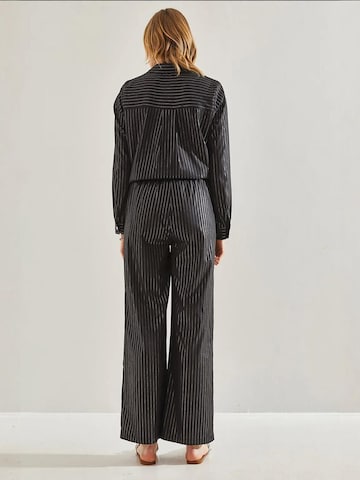 Bianco Lucci - Perna larga Calças em preto