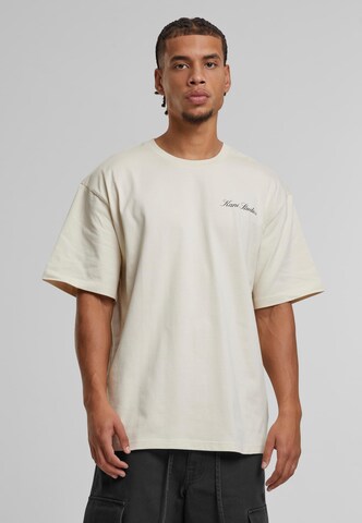 Maglietta di Karl Kani in beige: frontale