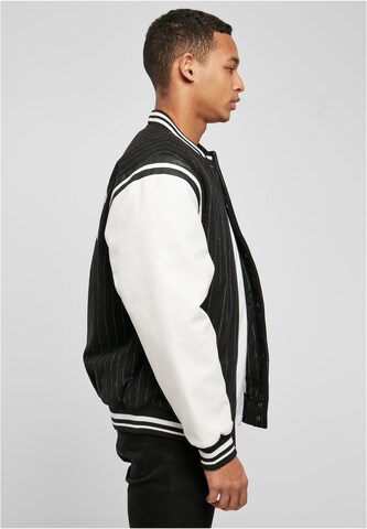 Karl Kani Between-season jacket 'KM222-023-1' in Black