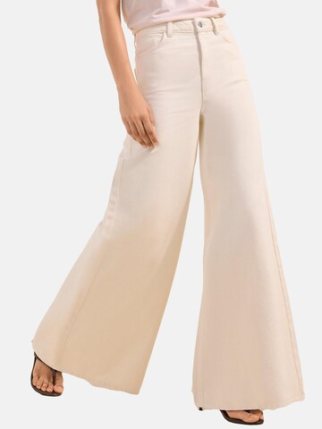 smėlio Friends Like These Plačios klešnės Džinsai: priekis