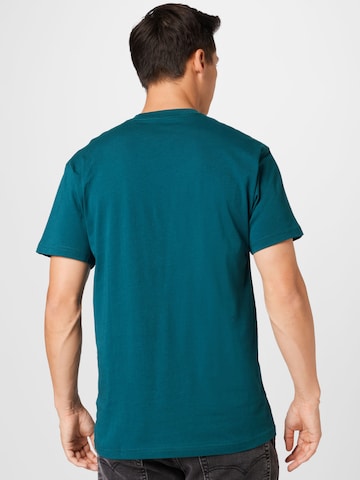 VANS جينز مضبوط قميص بلون أخضر