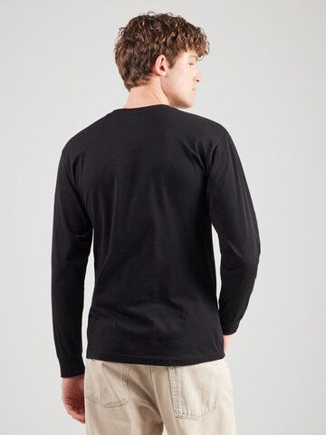 VANS - Camiseta 'VISUAL MINDS' en negro