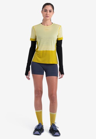 ICEBREAKER - Camiseta funcional 'Energy Wind' en amarillo