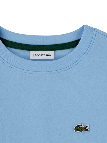 Maglietta di LACOSTE in blu