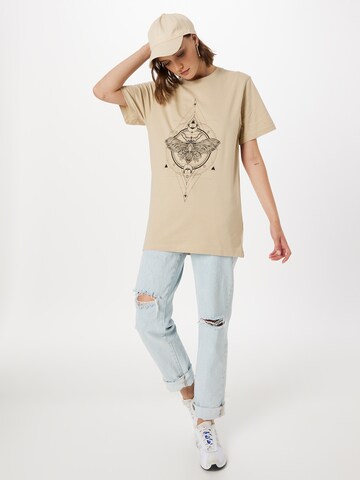 T-shirt Merchcode en beige