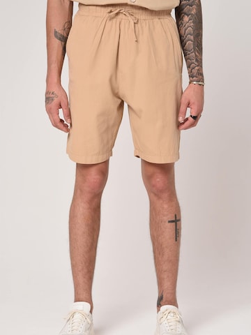 Antioch Regular Trousers in Beige: front
