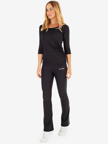 Winshape Bootcut Športne hlače 'BCHWL102' | črna barva