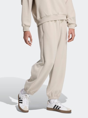 Largi Pantaloni sport 'Soft Luxe' de la ADIDAS SPORTSWEAR pe gri: față