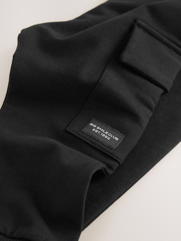 Tapered Pantaloni de la Next pe negru