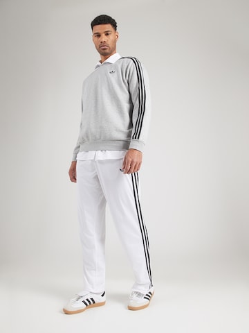 ADIDAS ORIGINALS Normalny krój Spodnie 'Firebird' w kolorze biały