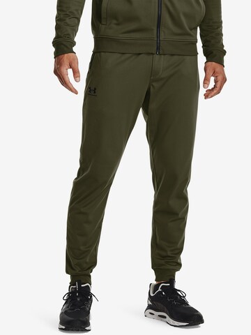 UNDER ARMOUR Tapered Sporthose in Grün: predná strana