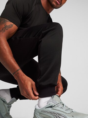 PUMA Tapered Trousers in Black