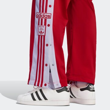 ADIDAS ORIGINALS Loose fit Pants in Red