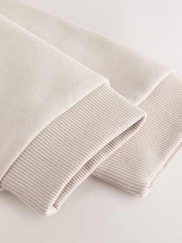 Felpa di Next in beige