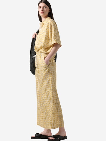 BOGNER Loose fit Trousers 'Emmy' in Yellow