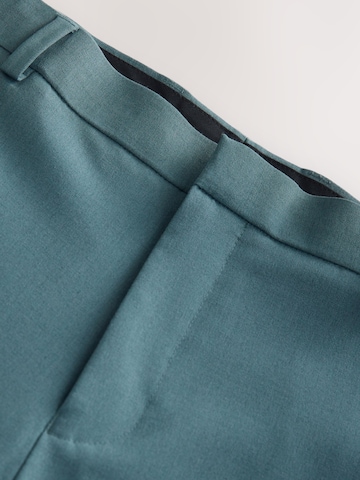 Slimfit Pantaloni chino 'Motionflex' di Next in blu