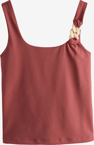 Haut Next en rouge : devant