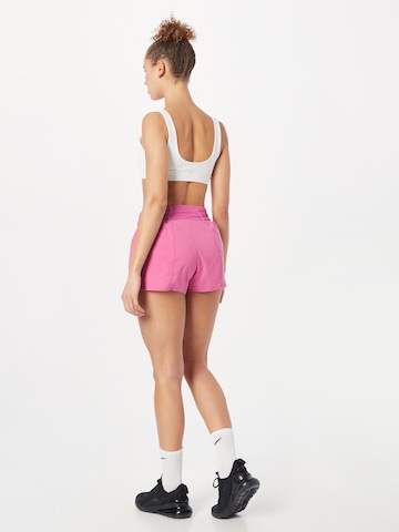 Regular Pantaloni sport de la NIKE pe roz