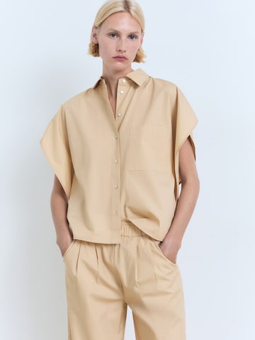MANGO Bootcut Hlače 'TOMY-H' | rjava barva