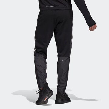 ADIDAS SPORTSWEAR Regular Sports trousers 'Own The Run Astro' in Black