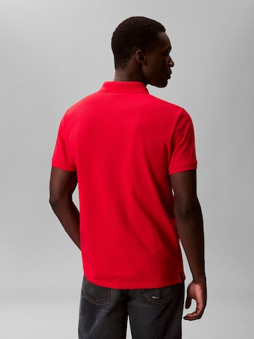 Tricou de la Calvin Klein Jeans pe roșu