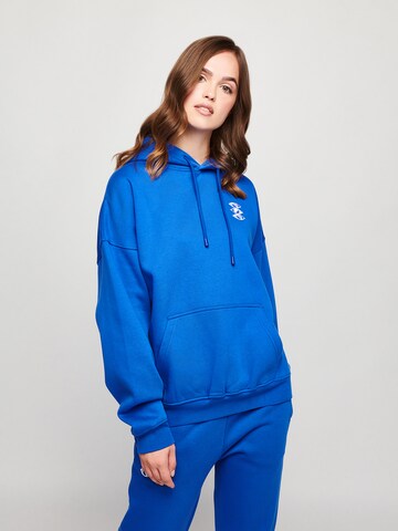 UNFOLLOWED x ABOUT YOU Sweatshirt 'MOOD' in Blauw: voorkant