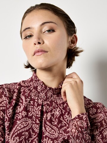 Chemisier ' ' Apricot en rouge