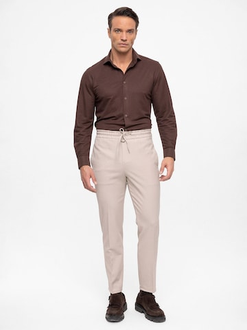 Antioch Regular Trousers with creases in Beige