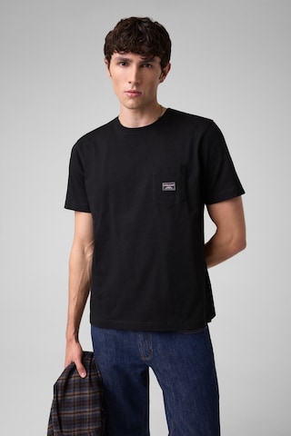 GUESS JEANS Футболка в Черный: спереди