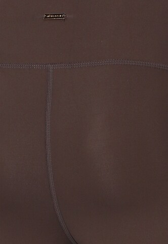 Athlecia Skinny Sports trousers 'Aliya' in Brown