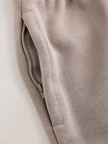 Next Normální Kalhoty – hnědá