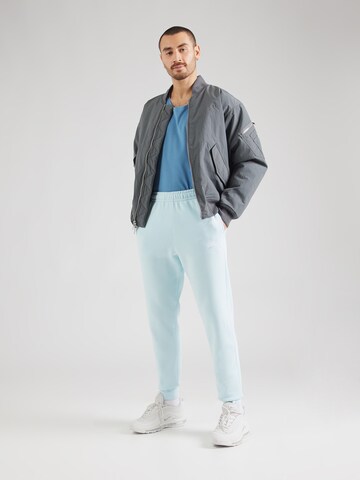 Tapered Pantaloni 'Club Fleece' di Nike Sportswear in blu