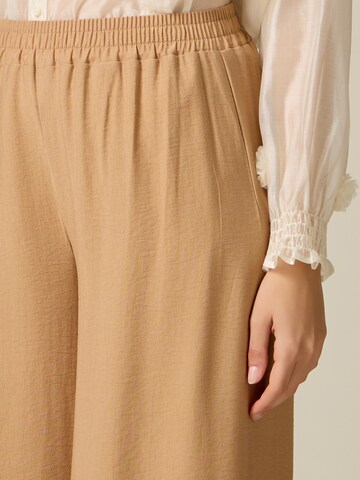 Baggy Pantaloni di oltre in beige