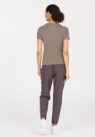 Athlecia Functioneel shirt 'Tinashe' in Bruin