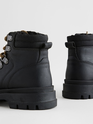 Bottes Next en noir