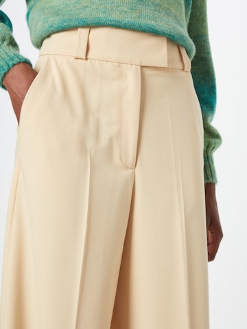 IVY OAK Wide leg Pleated Pants 'PEONY ROSE' in Yellow