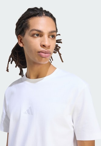 ADIDAS SPORTSWEAR - Camiseta funcional en blanco