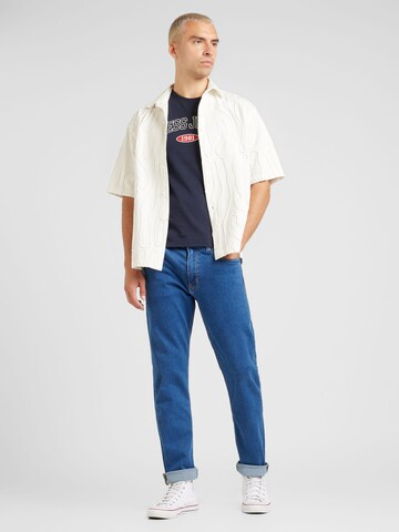 GUESS JEANS Slimfit Džíny – modrá